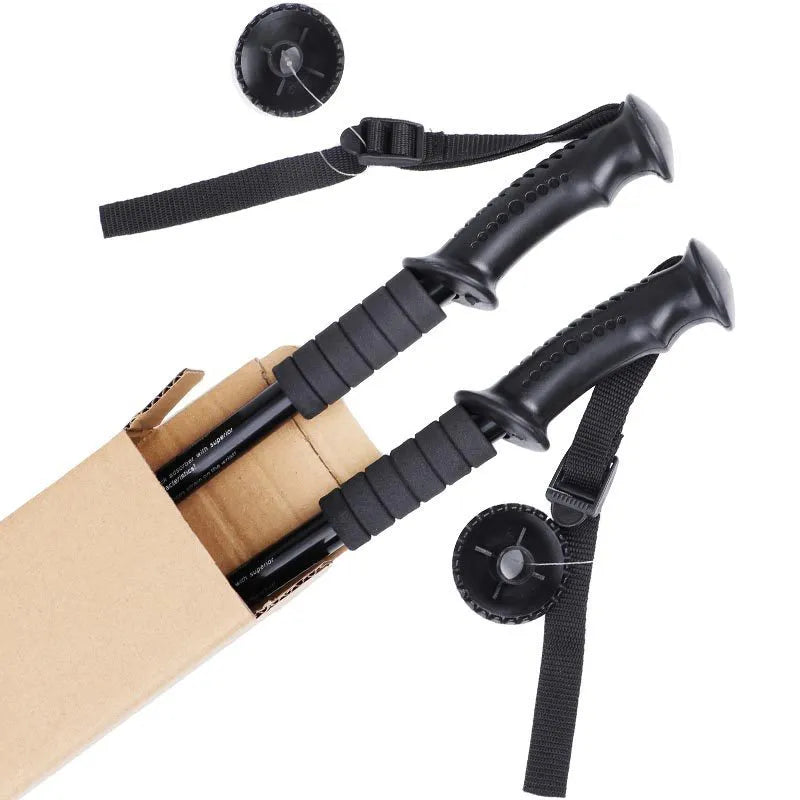 A pair of adjustable aluminium trekking poles with a three straight handle, shown with mud supports, snow holders, and foot covers.