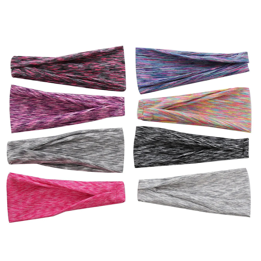 Placed flat, a plaid pattern sports headband in a neutral colour, with geometric elements at the centre