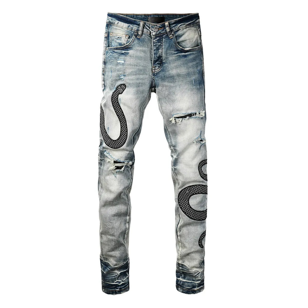 Man wearing 8934Blue distressed skinny jeans with a retro wash and skinny leg fit.