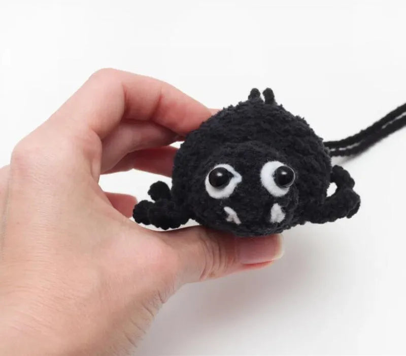 Plush hand-woven car hanging ornament in a cartoon design, made from soft polyester fabric.