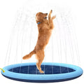 Large blue anti-slip dog splash pad with a textured surface in a sunny garden.