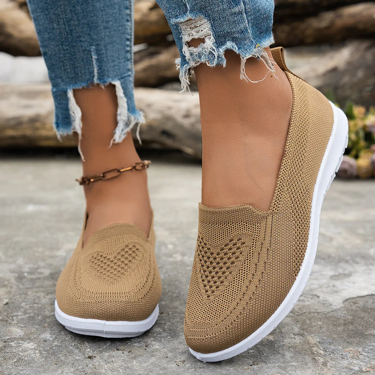 Women's mesh trainers with low flat heel and PVC sole, shown in a solid colour casual style