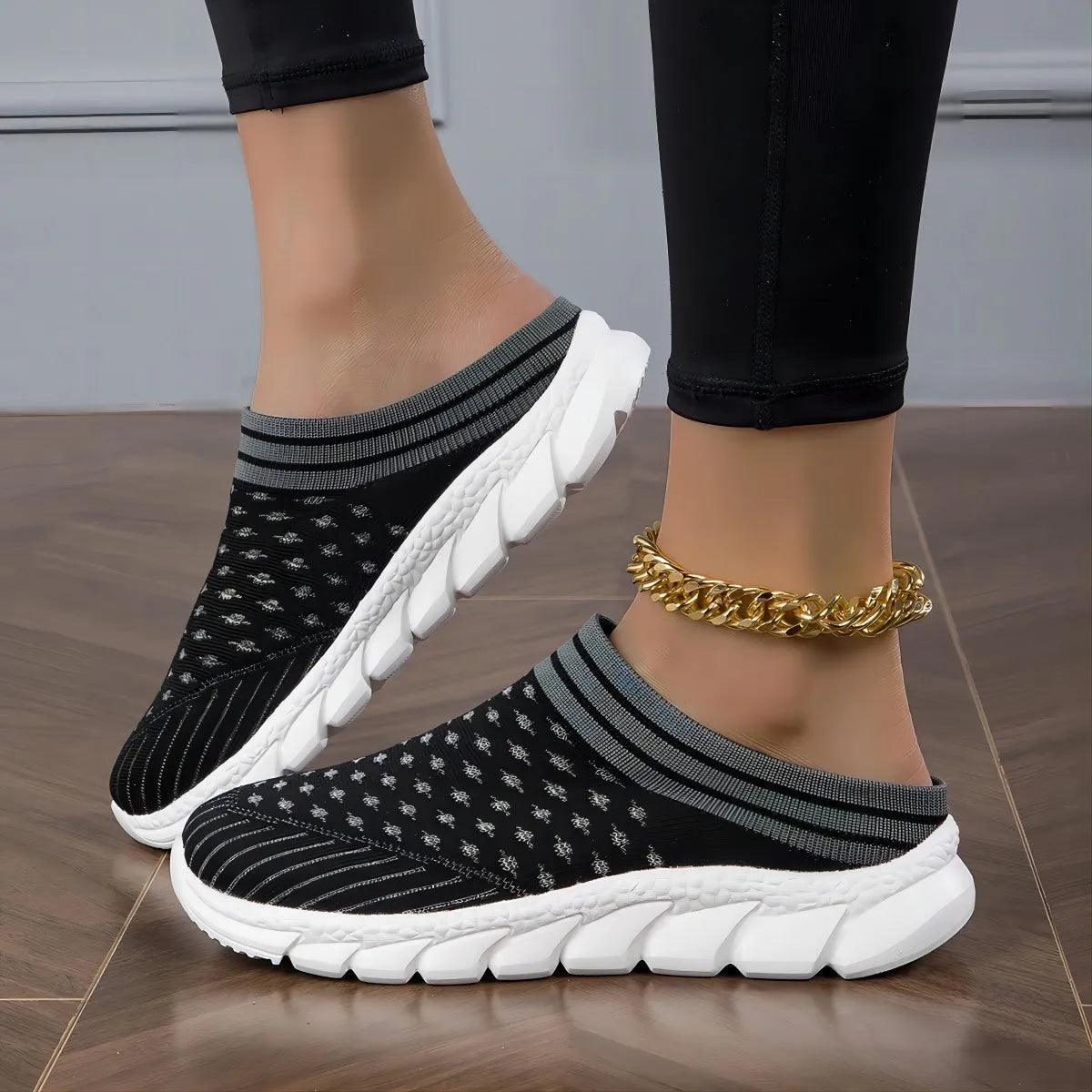 Women's Flyknit slip-on shoes with striped pattern and hollowed-out design in black colour