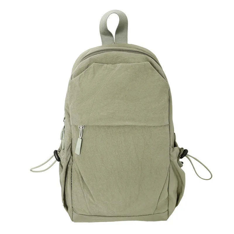 Multi-functional waterproof nylon backpack in black, free size, with curved shoulder strap and visible sewing thread detailing
