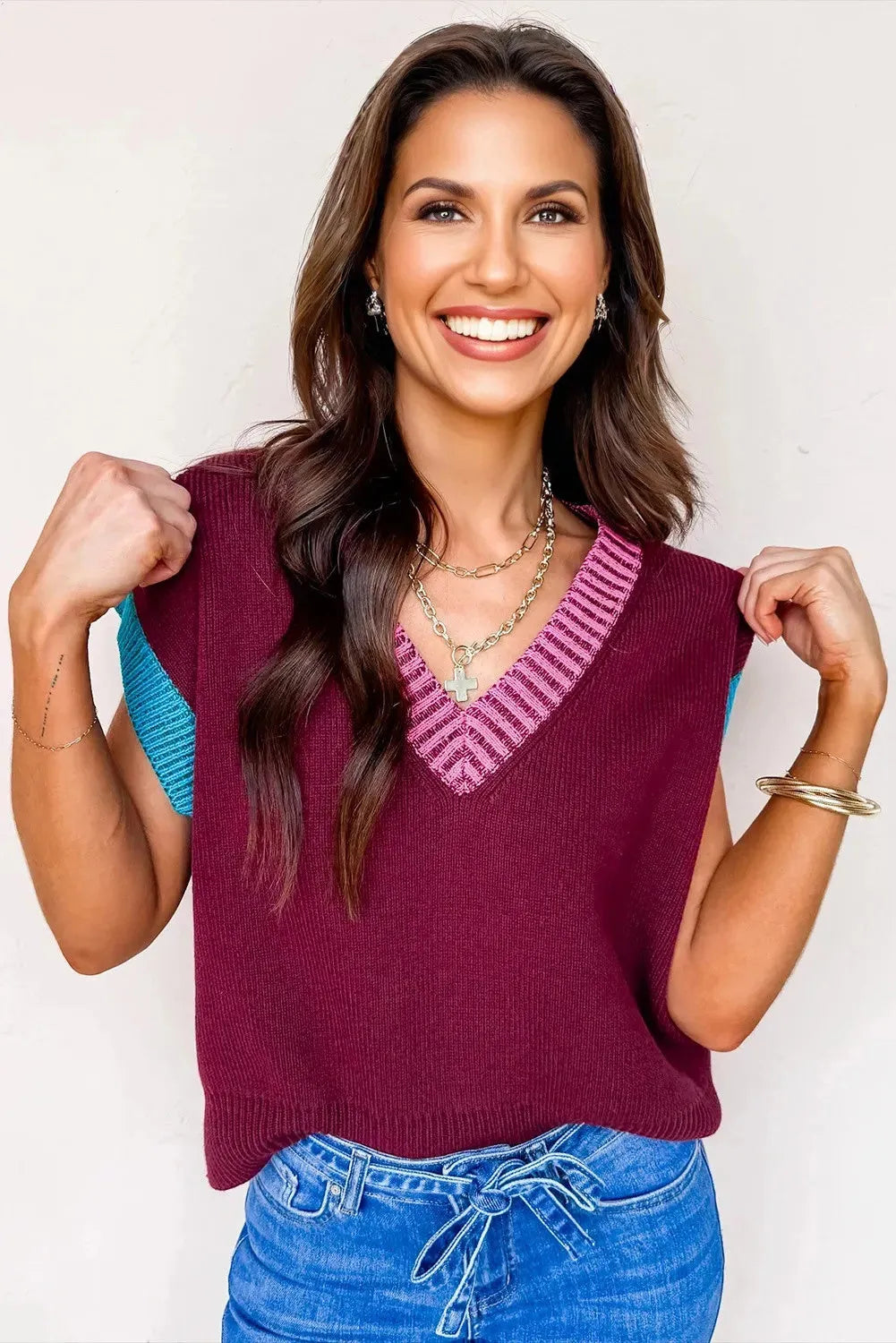 Burgundy women's loose V-neck sweater with cuffed short sleeves and contrast trim detail