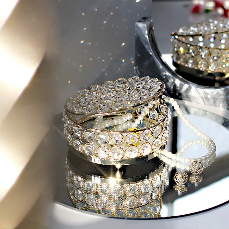 Crystal glass jewelry storage box with transparent sides and French gold metal frame