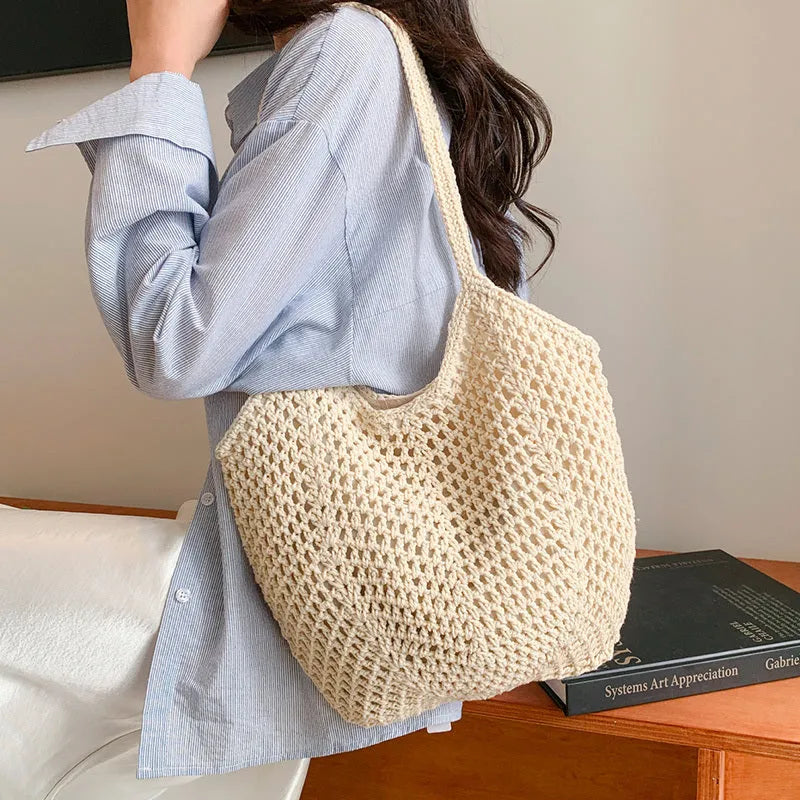 Hand-woven hollow shoulder bag in cotton and linen, beige colour, open pocket design with double straps