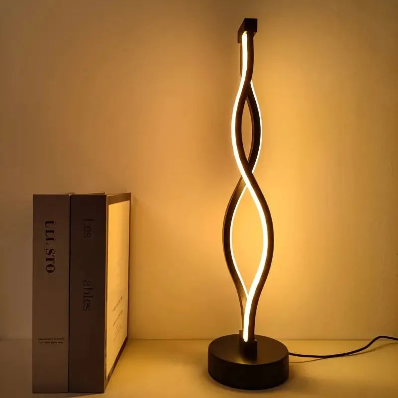 Black aluminium desk lamp with three-colour dimming button on creative stand