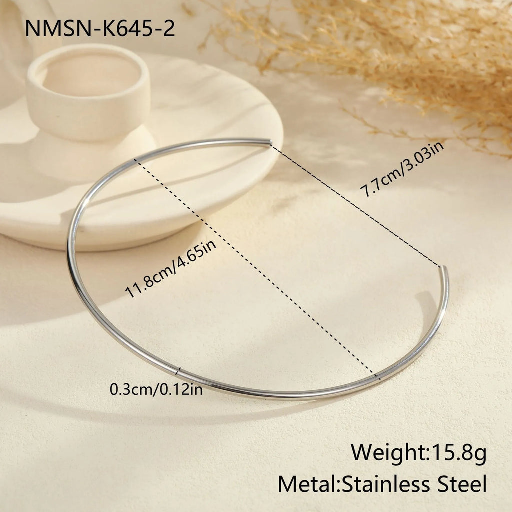Black rope titanium steel necklace with geometric pendants on a chain, available in gold or silver as a collar or full necklace.
