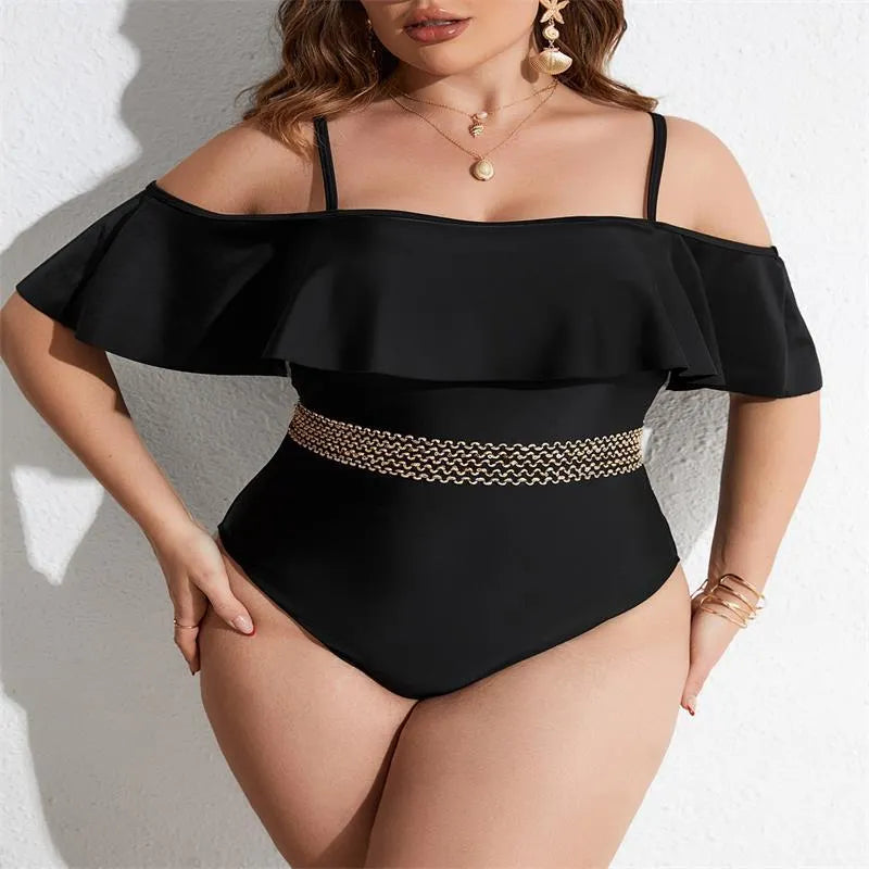 Black women's one-piece swimsuit on a hanger, plus size range 0XL to 4XL.