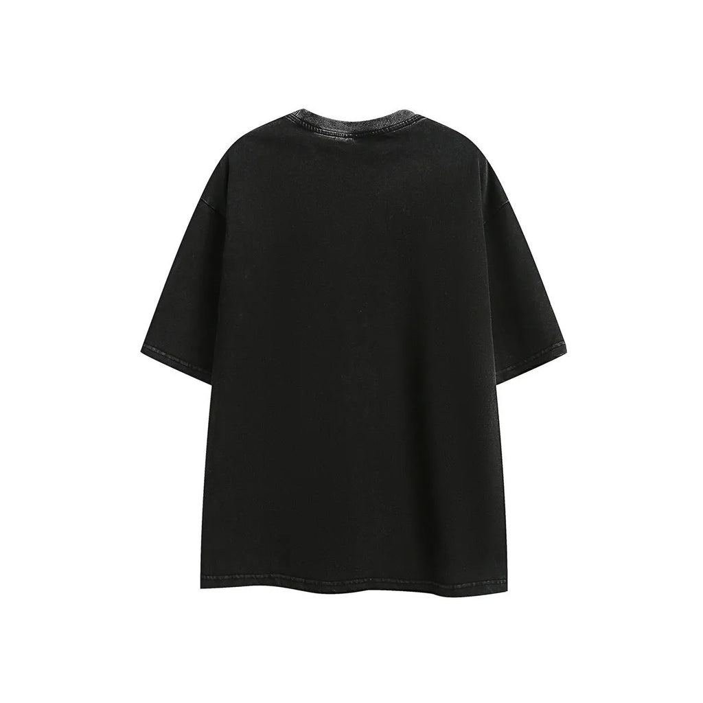 Man's loose fit retro half-sleeve t-shirt with embroidered wash finish in purple.