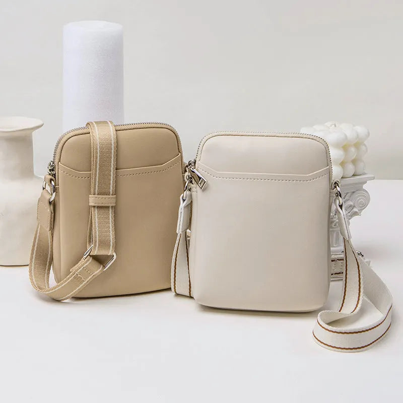 Solid colour women's PU crossbody phone bag shown in beige, displaying front view.