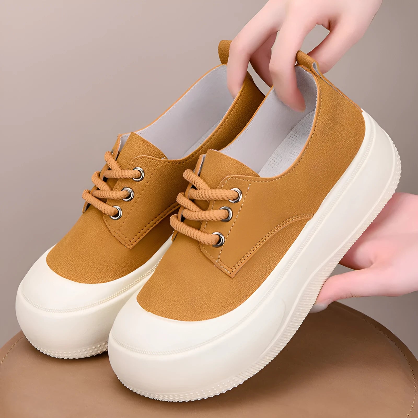 Camel suede women's platform loafers with round toe and front lace-up, showing 4cm thick sole.