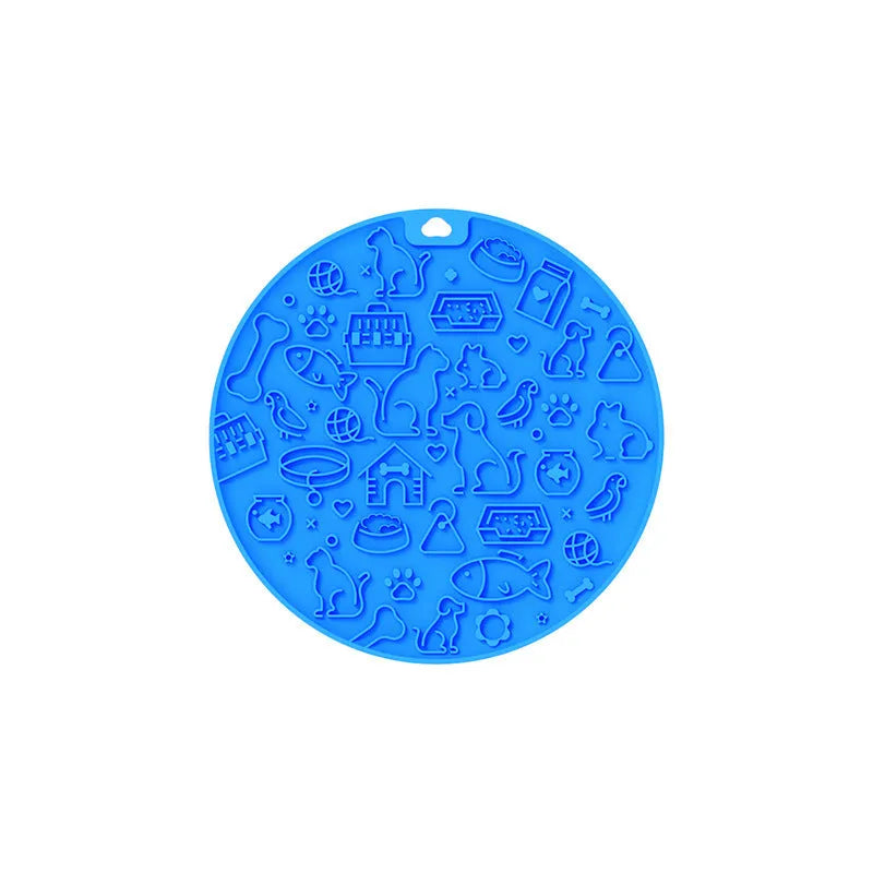 Round blue silicone pet licking mat with textured surface and white sucker on reverse.