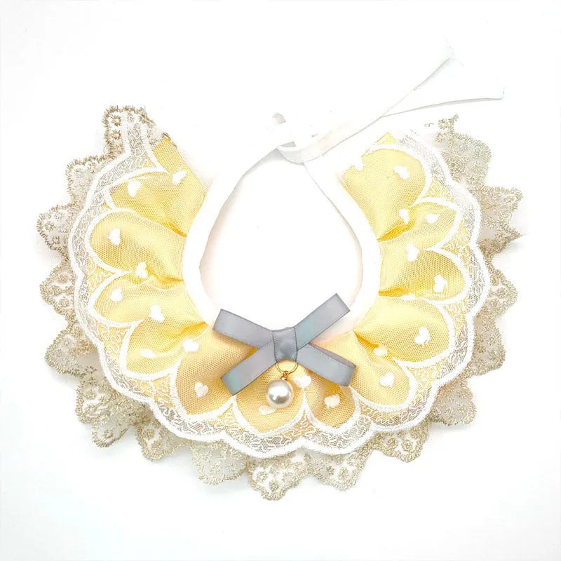 Yellow cat cotton bib with lace trim, princess style, on a white background showing front view with adjustable side lacing