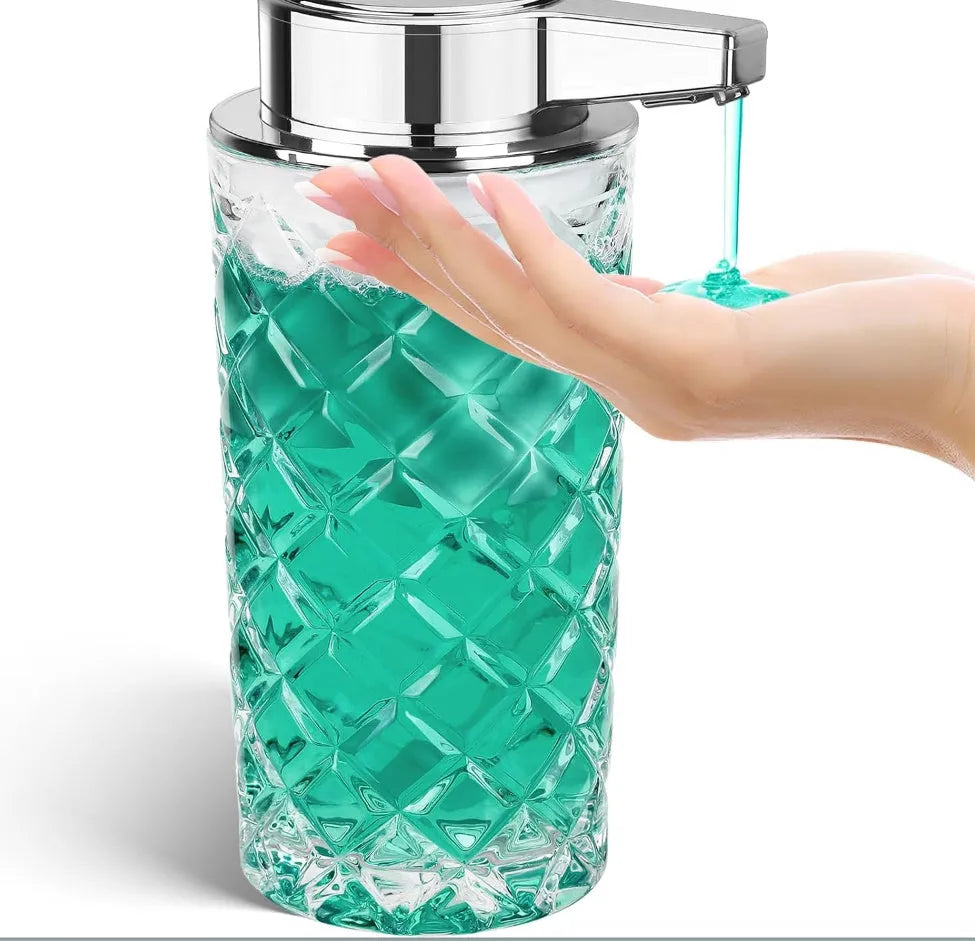 Silver automatic soap dispenser with USB Type-C charging port on a bathroom countertop.