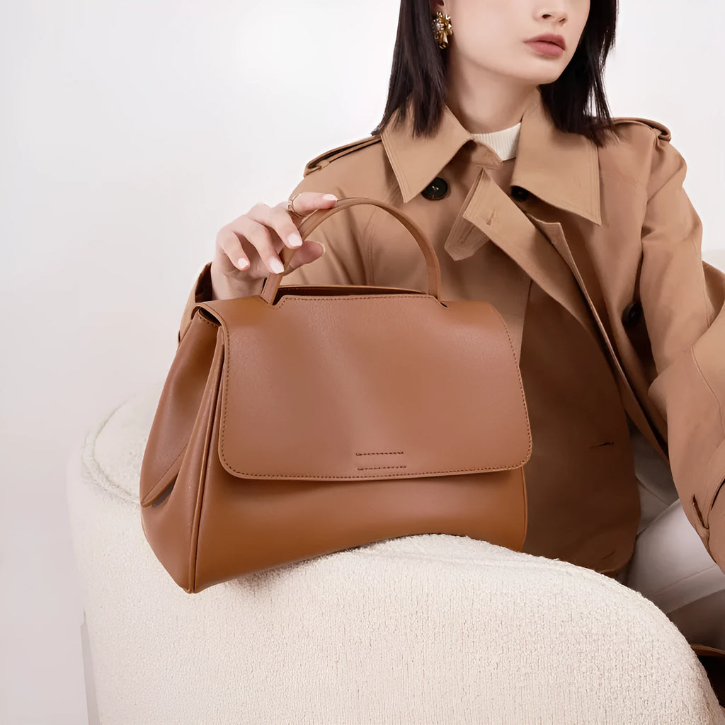 Genuine leather women's shoulder messenger bag in black, soft two-layer cowhide, horizontal square shape with sewing thread detail