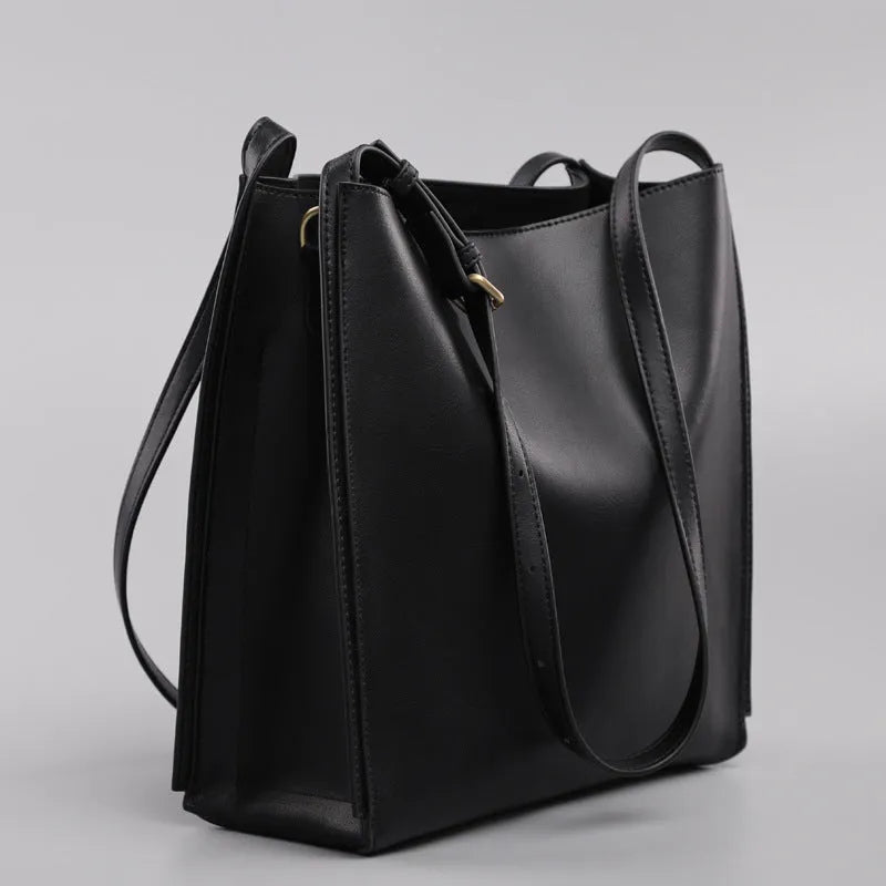 Genuine leather large capacity bucket shape women's handbag in brown with double shoulder straps and slit pocket