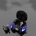Black and grey in-ear Bluetooth gaming headset with silicone ear tips on a dark background.