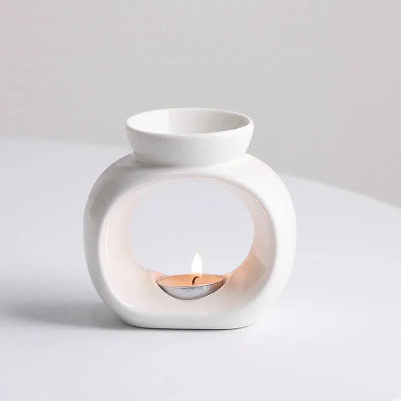White Nordic style ceramic aromatherapy stove ornament with anti-dry burning decorative design
