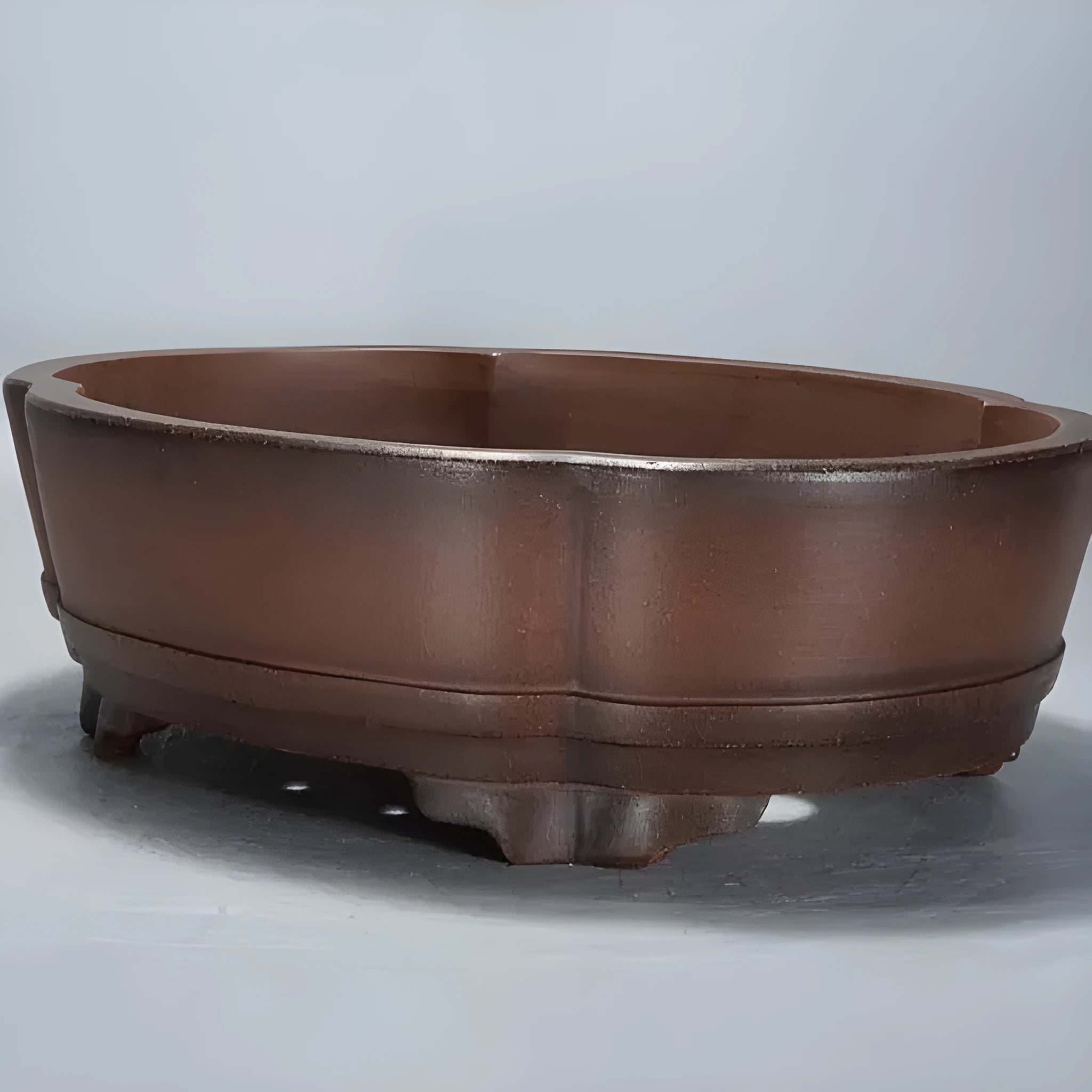 Large classic purple clay flower pot for plants or bonsai, shown from the side.