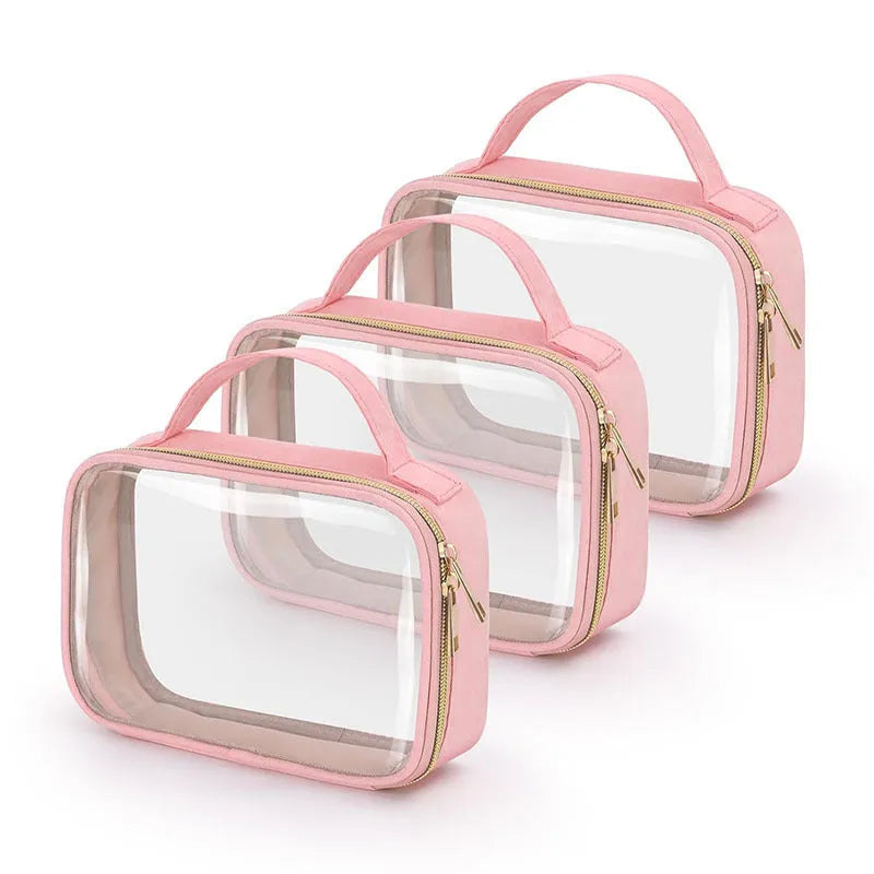 Transparent PVC makeup organiser bag with chain handle in assorted colours on a plain background.