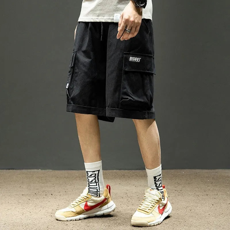 Men's cotton cargo shorts in khaki with multiple pockets and tie-cord front closure