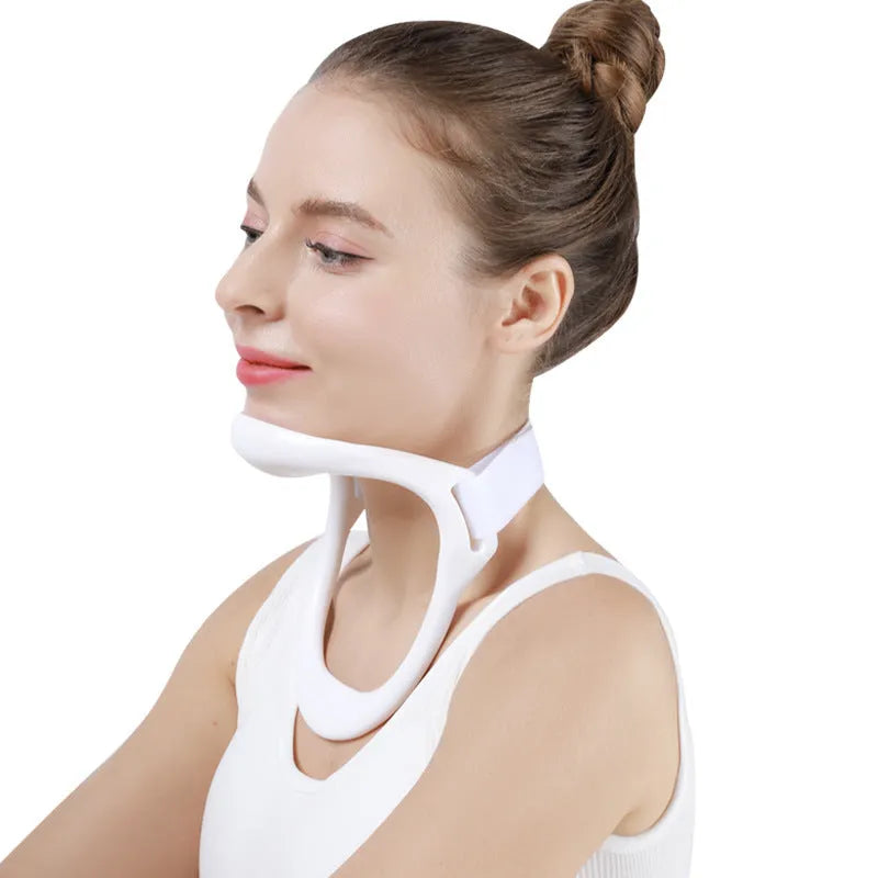 White adjustable neck support brace for cervical spine and shoulder posture correction.