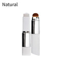Blanc Cover cream foundation stick and removable brush on a light background