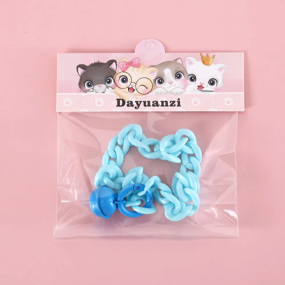 Adjustable plastic pet collar in candy chain blue colour on a white background, showing the monochrome pattern.
