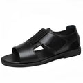 Men's black leather Roman-style open-toe sandals with a non-slip rubber sole.