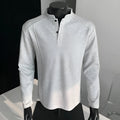 Men's grey asymmetric patchwork polo shirt with a stand-up collar, long sleeves, and a loose fit.