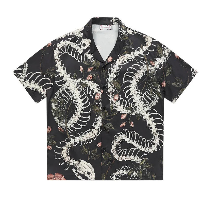 Short sleeve loose fit Cuban collar shirt with snake bone and floral printed pattern in various colours.