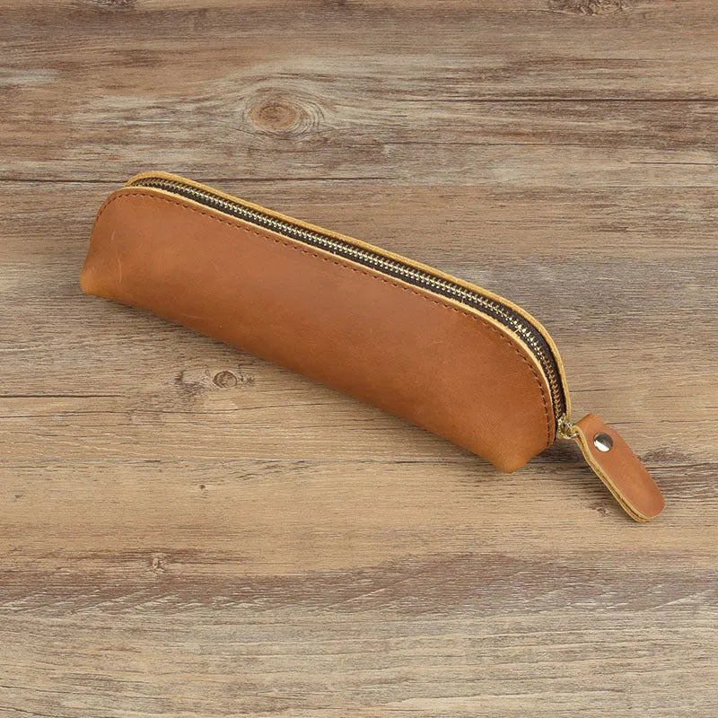 Square leather pencil case with zip closure in black colour showing 18cm dimensions