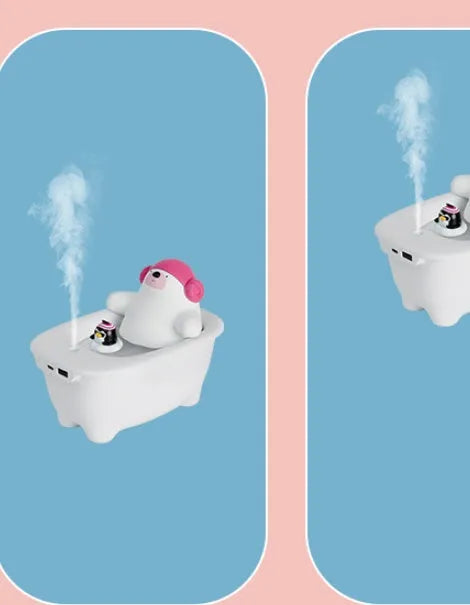 White USB air humidifier and essential oil diffuser with 550ml water tank on a desk.