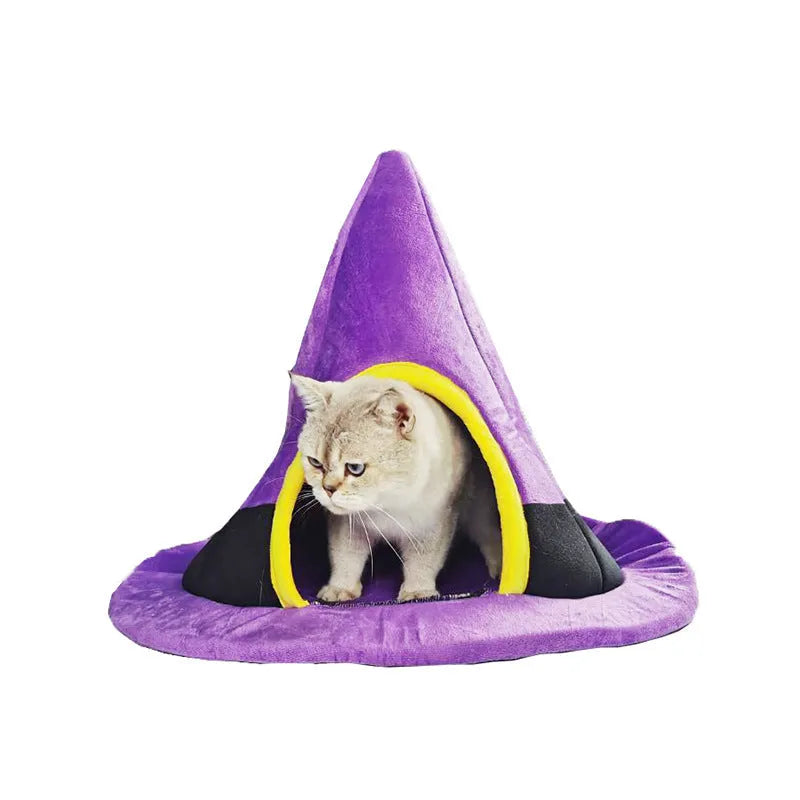 Purple Halloween witch hat shaped cat bed for pets, showing soft cloth material and enclosed design.