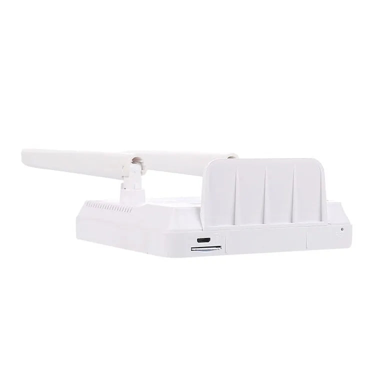 Home office LTE router with two antennas and USB cable on a desk