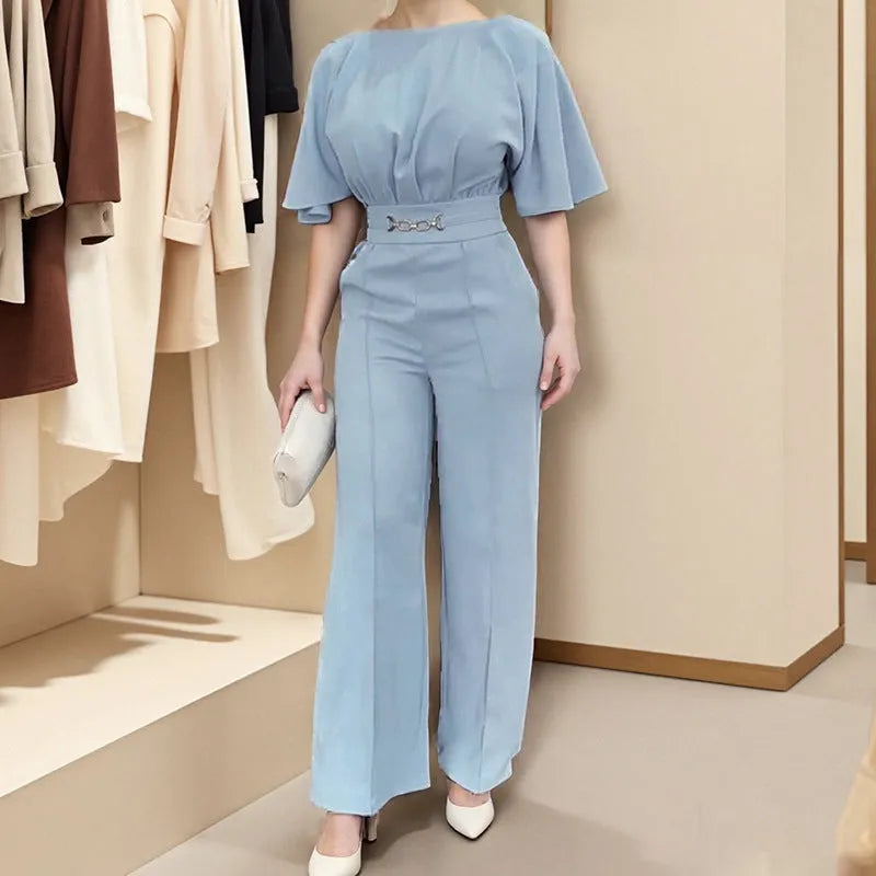 Blue men's casual polyester suit with long sleeve jacket and trousers on a hanger