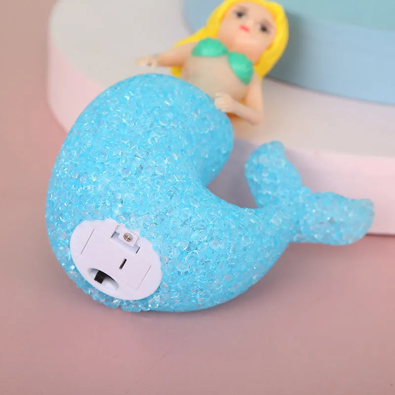 Plastic mermaid LED night light with colourful glow, 15.4cm high, available in white, pink, or blue