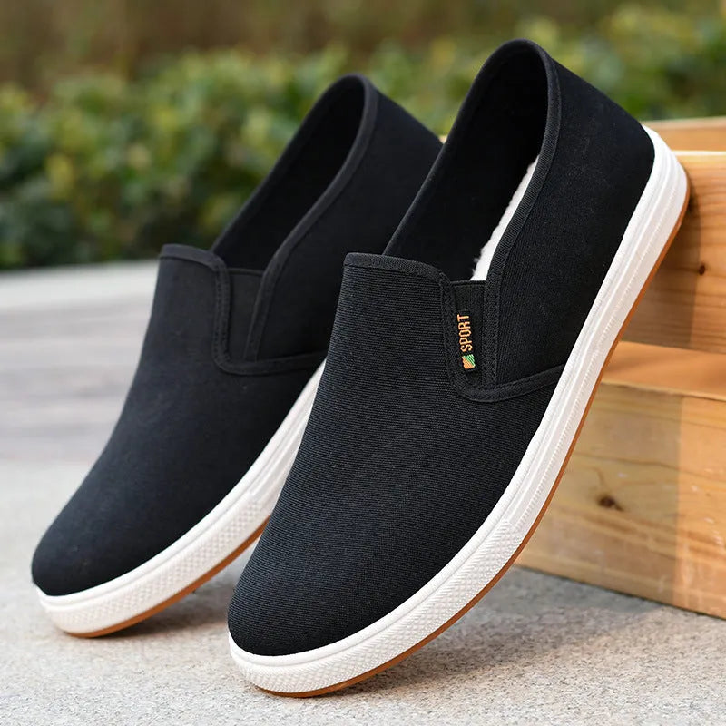 Men's black slip-on canvas cloth shoes with round toe and shallow mouth design