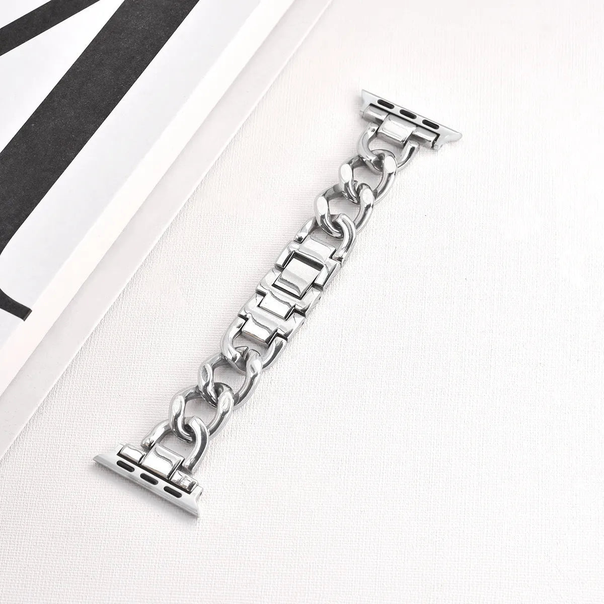 Metal denim chain design Apple Watch strap in silver, black, gold, rose gold and Starlight colours for 38mm to 49mm models.