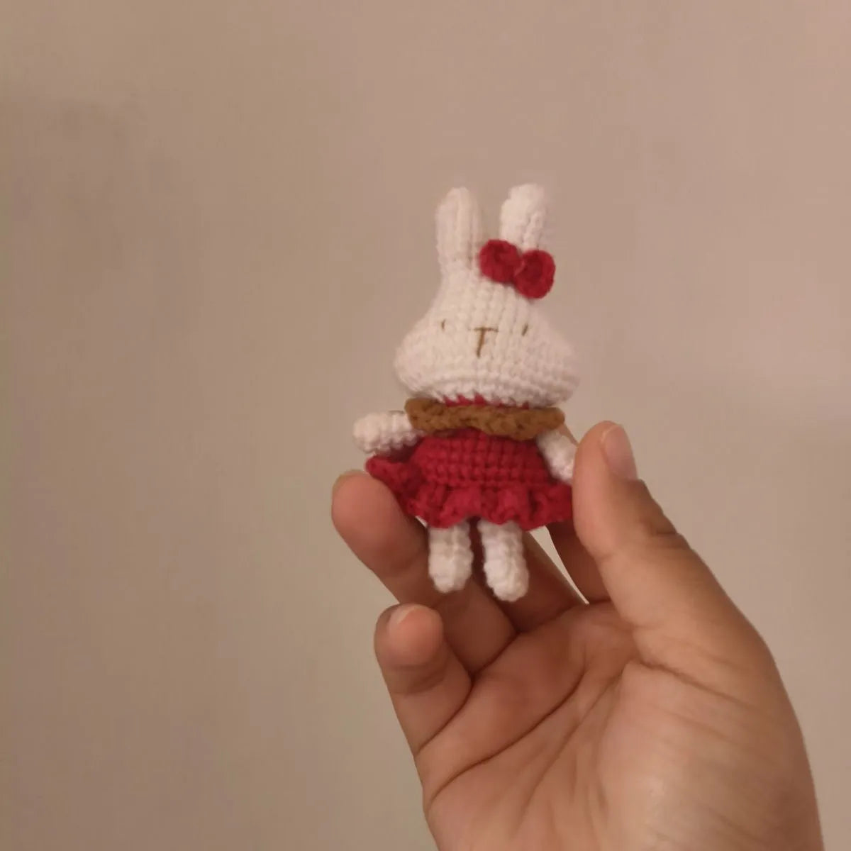 Hand-crocheted wool rabbit key chain with animal pendant design