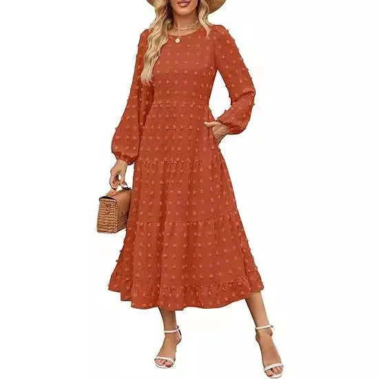 Women's beige high waist long sleeve dress with ruffled sleeves on a hanger.