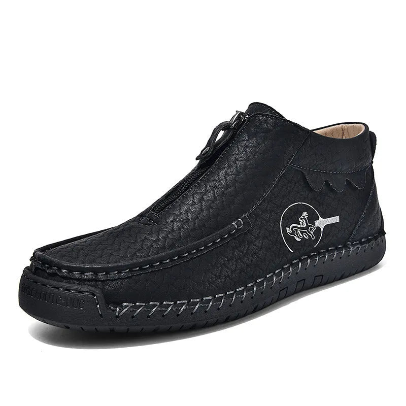 Men's black slip-on loafers with round toe and rubber sole on a white background.
