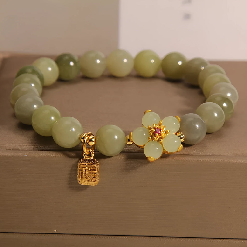 Women's alloy bracelet in grey jade colour with clasp closure for casual wear.