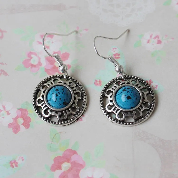 Miao silver retro turquoise flower disk earrings with auspicious patterns in black, blue, or red.