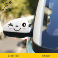 Reflective cartoon car sticker design on a vehicle door, showing a cute eyes graphic.