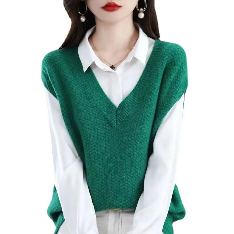 V-neck sleeveless knitted vest with 3D pattern in acrylic fabric shown in creamy-white colour