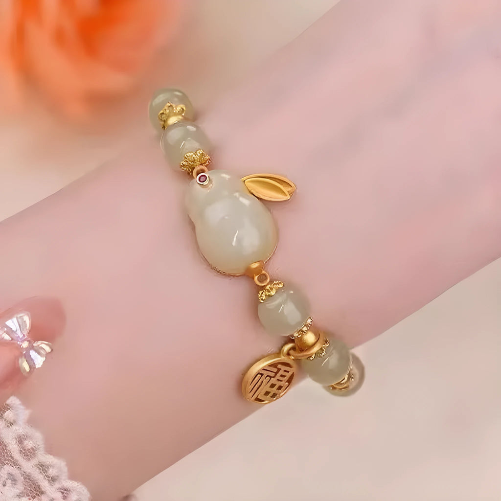 Green Lucky Jade adjustable bracelet with fu character and hare charm on black hand style band