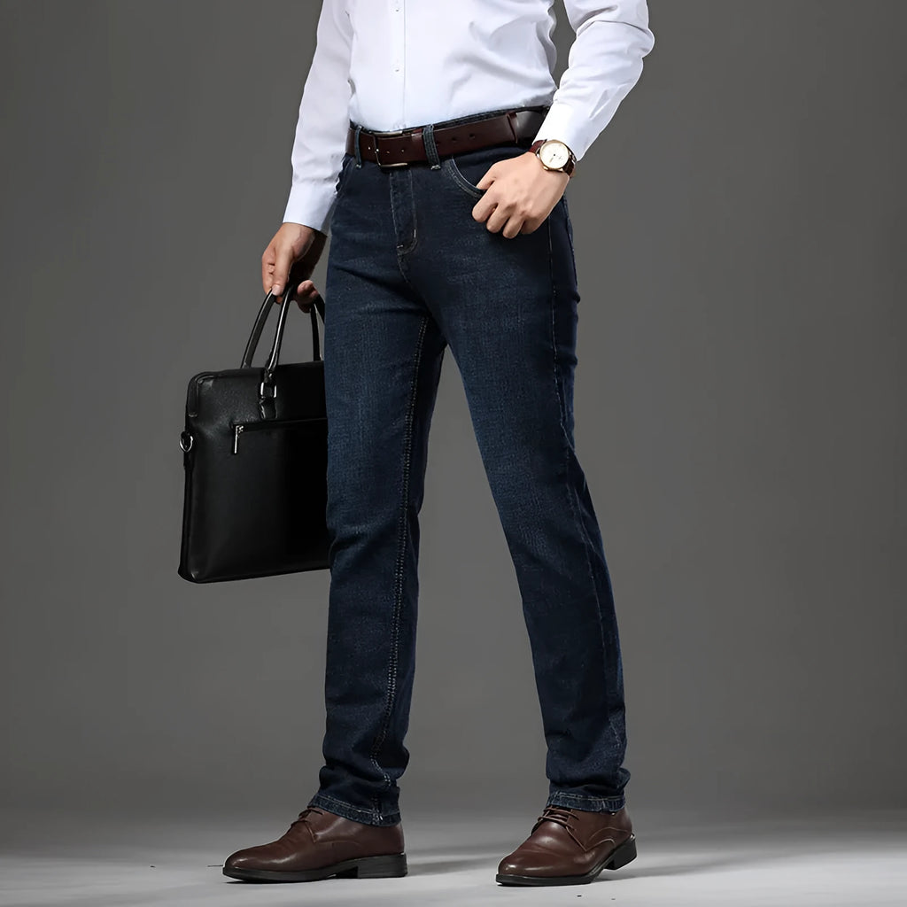 Loose fit straight-leg stretch jeans in black and blue denim colours on a hanger